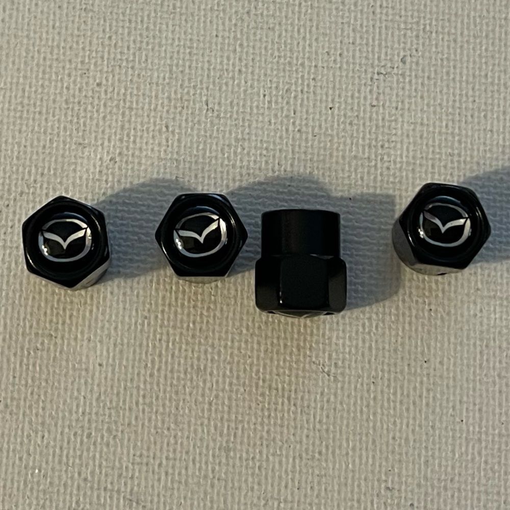 Mazda valve Stem caps in Black set of 4 NWT